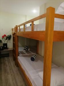 Postel nebo postele na pokoji v ubytování Acapulco Resort