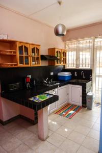 Kitchen o kitchenette sa 3 bedrooms apartement at Pamplemousses 800 m away from the beach with private pool enclosed garden and wifi