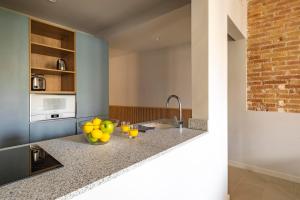 A kitchen or kitchenette at Aspasios Garden Apartments