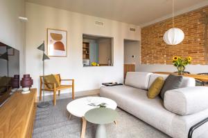 A seating area at Aspasios Garden Apartments