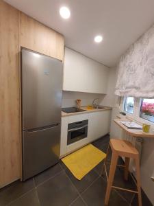 A kitchen or kitchenette at Piso en el Burgos Histórico