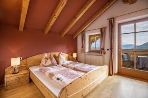 Posteľ alebo postele v izbe v ubytovaní Oberplunerhof - Fewo Bruneck