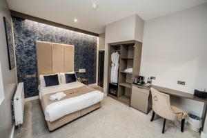 Postel nebo postele na pokoji v ubytování Stay Hotel