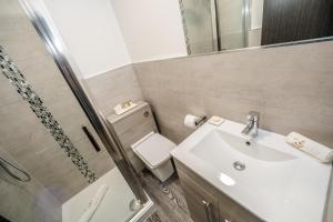 Koupelna v ubytování Stay Hotel