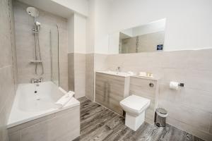Koupelna v ubytování Stay Hotel