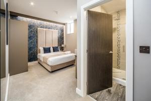 Postel nebo postele na pokoji v ubytování Stay Hotel