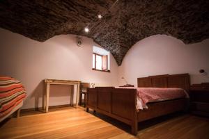 A bed or beds in a room at Sci e montagna vera