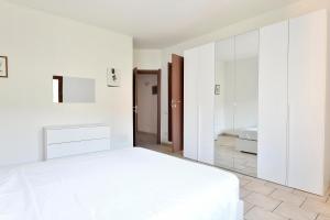Posteľ alebo postele v izbe v ubytovaní Appartamento Girasole