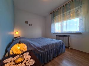 Posteľ alebo postele v izbe v ubytovaní Apartments Fazanska 930