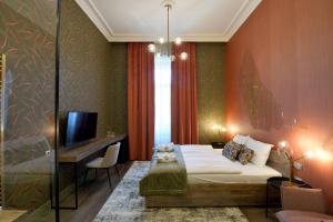 Posteľ alebo postele v izbe v ubytovaní 1552 Boutique Hotel