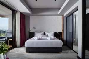 Katil atau katil-katil dalam bilik di Hotel Panoramika Design & Spa
