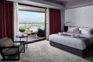 Katil atau katil-katil dalam bilik di Hotel Panoramika Design & Spa