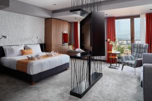 Katil atau katil-katil dalam bilik di Hotel Panoramika Design & Spa