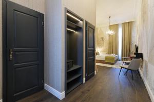 Posteľ alebo postele v izbe v ubytovaní 1552 Boutique Hotel