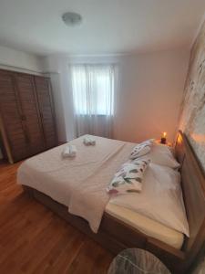 Postel nebo postele na pokoji v ubytování Apartment Kos