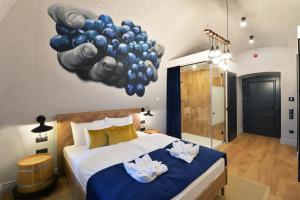 Posteľ alebo postele v izbe v ubytovaní 1552 Boutique Hotel