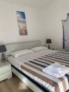 Postel nebo postele na pokoji v ubytování Villaggio Benvivere
