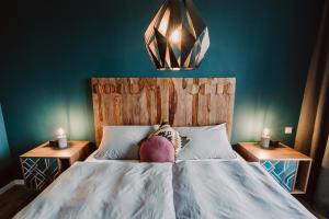 Postel nebo postele na pokoji v ubytování Schlafladen Hildesheim Hotel & Hostel + 16 fotografií