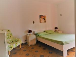 Posteľ alebo postele v izbe v ubytovaní Apartment in Patti Marina: a step away from the sea and from the center!