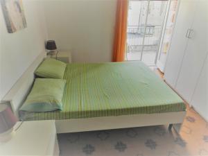 Posteľ alebo postele v izbe v ubytovaní Apartment in Patti Marina: a step away from the sea and from the center!