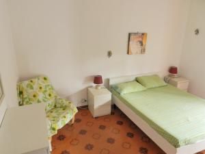 Posteľ alebo postele v izbe v ubytovaní Apartment in Patti Marina: a step away from the sea and from the center!