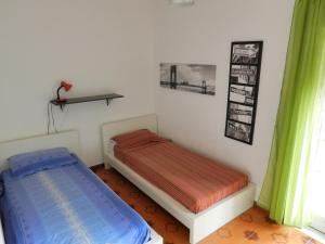 Posteľ alebo postele v izbe v ubytovaní Apartment in Patti Marina: a step away from the sea and from the center!