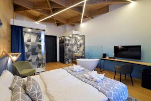 Posteľ alebo postele v izbe v ubytovaní 1552 Boutique Hotel