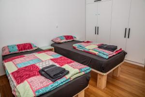 En eller flere senger på et rom på 5 Sterne Apollo City Apartment