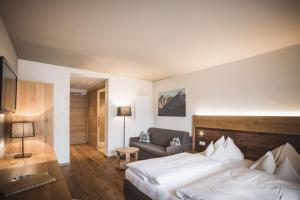A bed or beds in a room at Autentis