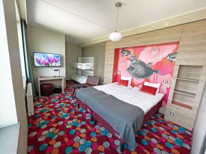 Postel nebo postele na pokoji v ubytování Motel L Lund