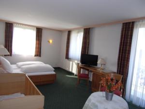 Postel nebo postele na pokoji v ubytování Hotel Landgasthof Hacker