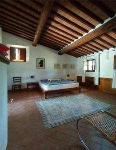 Un pat sau paturi într-o cameră la Casanova di Ricavo