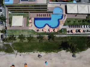 an aerial view of a resort with a swimming pool at Brisas de Tabatinga Flat in Conde