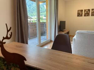 TV a/nebo společenská místnost v ubytování Monika-Mellau Appartements
