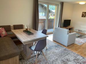 TV a/nebo společenská místnost v ubytování Monika-Mellau Appartements