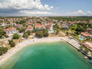 an aerial view of a beach and a city at Apartments Estelle in Pula