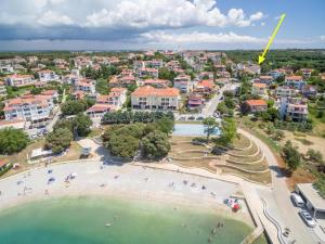 an aerial view of a beach and a city at Apartments Estelle in Pula