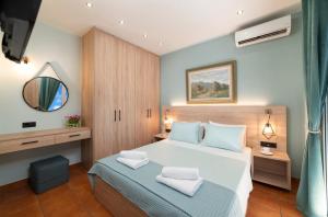 Posteľ alebo postele v izbe v ubytovaní Casa Kaneli Luxury Villa Elounda