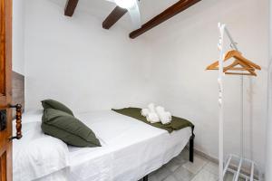 Postel nebo postele na pokoji v ubytování Hauzify I Domus Tarragona