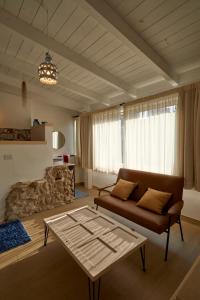A seating area at Upstairs - Skylight