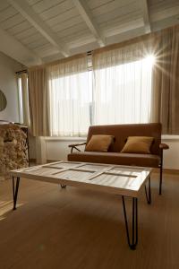 A seating area at Upstairs - Skylight
