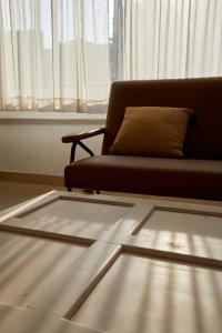 A seating area at Upstairs - Skylight