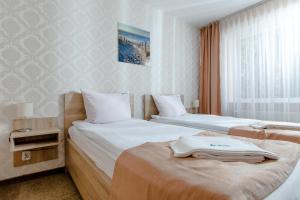 Posteľ alebo postele v izbe v ubytovaní Millennium Health Resort & Spa