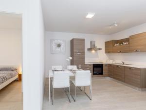 Кухня или мини-кухня в Apartment Aria
