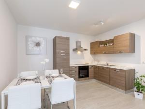 Кухня или мини-кухня в Apartment Aria
