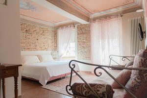 Posteľ alebo postele v izbe v ubytovaní Il Giardino sul Tetto B&B