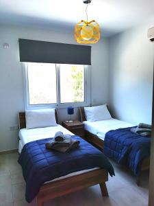 Postel nebo postele na pokoji v ubytování Villa Alba, Luxury 4 BDRM Villa with Heated Pool