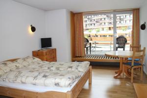 Postel nebo postele na pokoji v ubytování Hotel Zodiaque