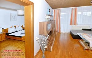 Łóżko lub łóżka w pokoju w obiekcie Ferienwohnung Woody