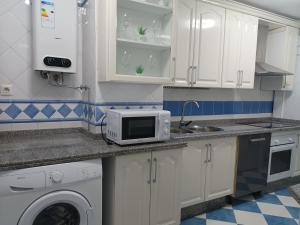 Kuchyňa alebo kuchynka v ubytovaní Sherryhouse